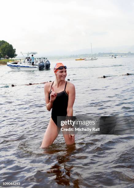 Charlene Wittstock, the future Princess of Monaco, gestures after finishing her race in the Iron Man and Physically Challenged Event of the 2011...