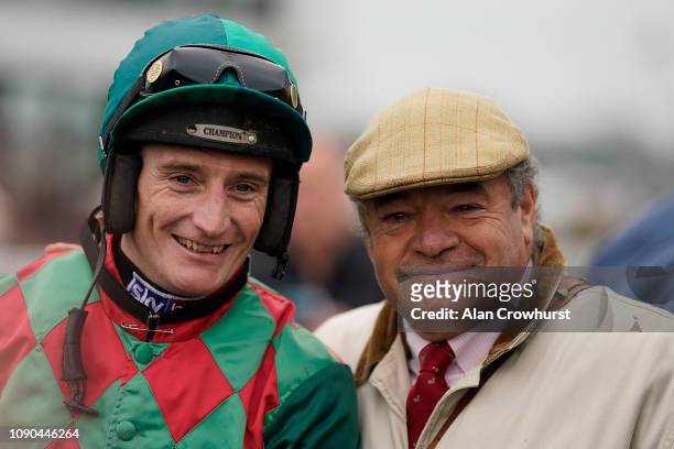 French trainer Guillaume Macaire poses with jockey Daryl Jacob at Plumpton Racecourse on January 06, 2019 in Plumpton, England.
