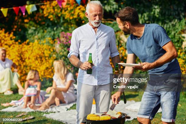 generation spring picnic - sunny backyard stock pictures, royalty-free photos & images