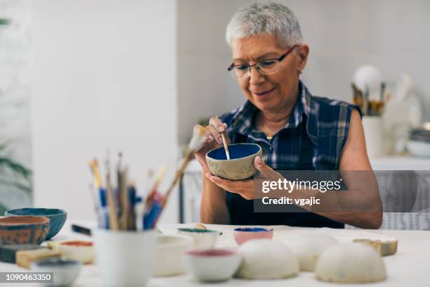 seniors ceramic workshop - making painting stock pictures, royalty-free photos & images