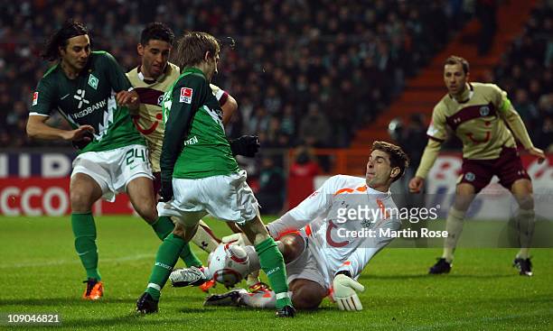 Marko Marin of Bremen fails to score over Ron Robert Zieler , goalkeeper of Hannover during the Bundesliga match between Werder Bremen and Hannover...