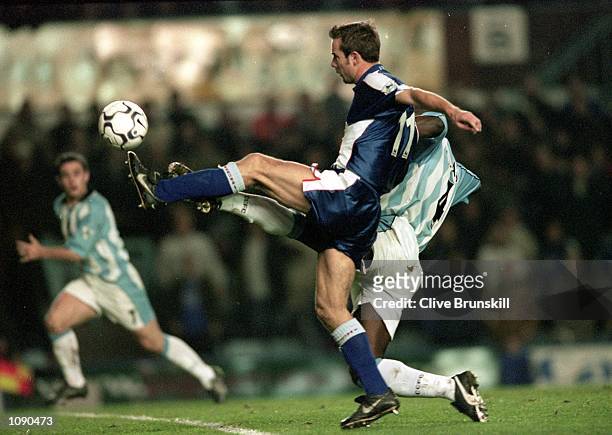 Marcus Stewart of Ipswich Town reaches the ball ahead of Paul Williams of Coventry City during the FA Carling Premiership match played at Highfield...