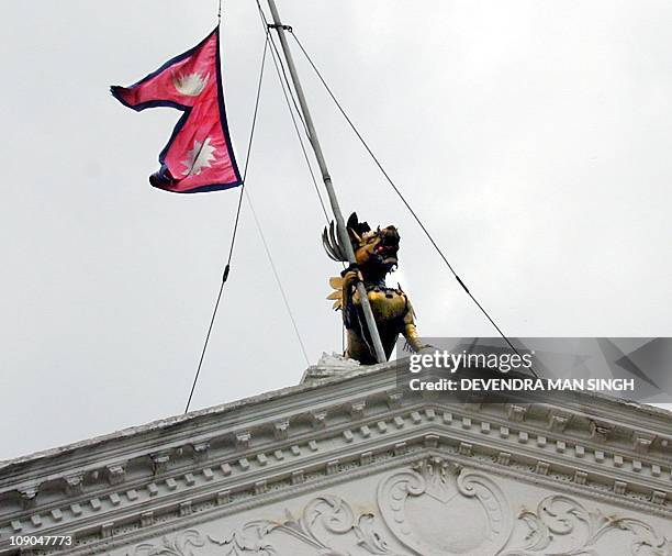 The national flag of Nepal flies at half mast at the Central Secretariat of Singha Durbar to mourn the death of King Birendra and Queen Aishwarya and...