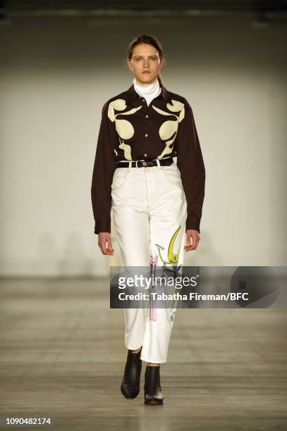 Model walks the runway at the Alex Mullins show during London Fashion Week Men's January 2019 at the BFC Show Space on January 06, 2019 in London,...