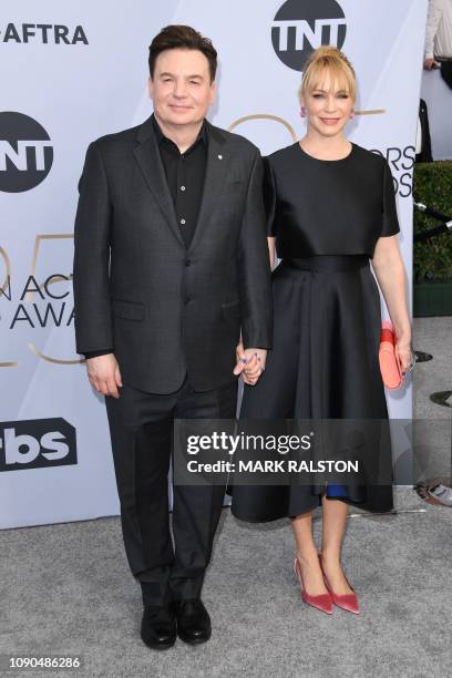 Actor Mike Myers and wife Kelly Tisdale arrive for the 25th Annual Screen Actors Guild Awards at the Shrine Auditorium in Los Angeles on January 27,...