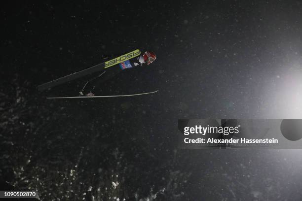 Markus Eisenbichler of Germany competes during the first round on day 8 of the 67th FIS Nordic World Cup Four Hills Tournament ski jumping event at...