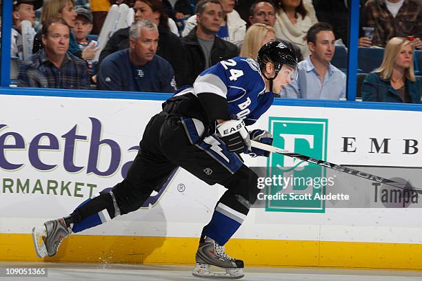 Johan Harju of the Tampa Bay Lightning races up ice against the Carolina Hurricanes at the St. Pete Times Forum on February 12, 2011 in Tampa,...