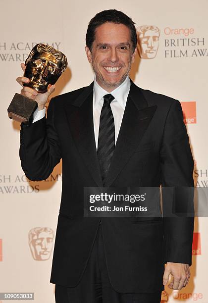Lee Unkrichposes with the award for Animated Film for the film "Toy Story 3" during the 2011 Orange British Academy Film Awards at The Royal Opera...