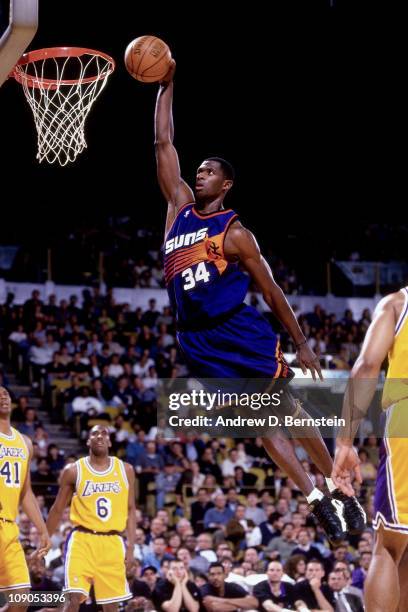 Antonio McDyess of the Phoenix Suns dunks against the Los Angeles Lakers in a game on March 18, 1998 at The Forum in Inglewood, California. NOTE TO...