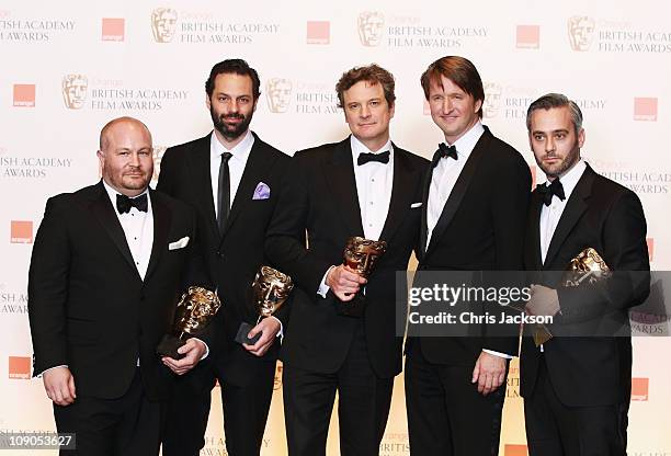 Gareth Unwin, Emile Sherman, Colin Firth, Tom Hooper and Iain Canning pose with the award for Best Film for the film "The King's Speech" during the...