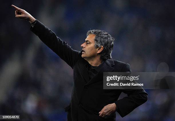 Jose Mourinho of Real Madrid reactsduring La Liga match between RCD Espanyol and Real Madrid at Estadi Cornella-El Prat on February 13, 2011 in...