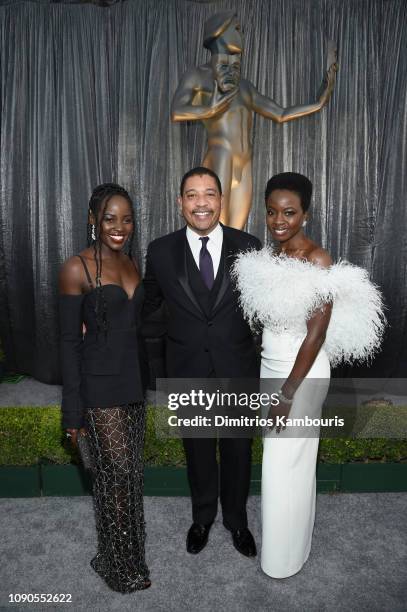 Lupita Nyong'o, SAG-AFTRA National Executive Director David P. White, and Danai Gurira attend the 25th Annual Screen Actors Guild Awards at The...