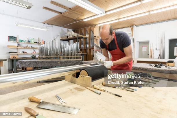 organ builder, cutting an organ pipe, pre-intonation, laberweinting, bavaria, germany - church organ stock pictures, royalty-free photos & images