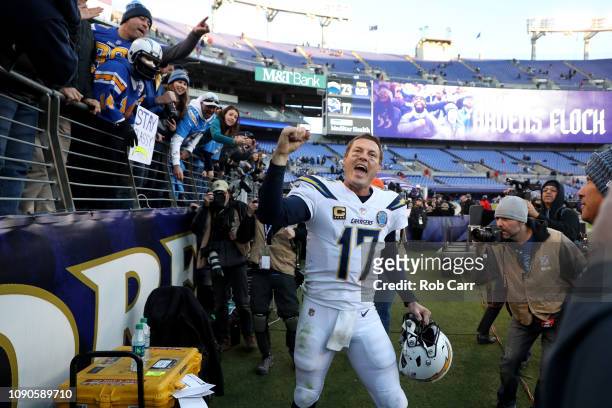 Philip Rivers of the Los Angeles Chargers celebrates after defeating the Baltimore Ravens after the AFC Wild Card Playoff game at M&T Bank Stadium on...
