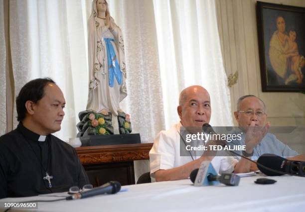 Catholic Archbishop of Davao, and president of Catholic Bishop's Conference of the Philippines , Romulo Valles speaks while fellow bishops Pablo...