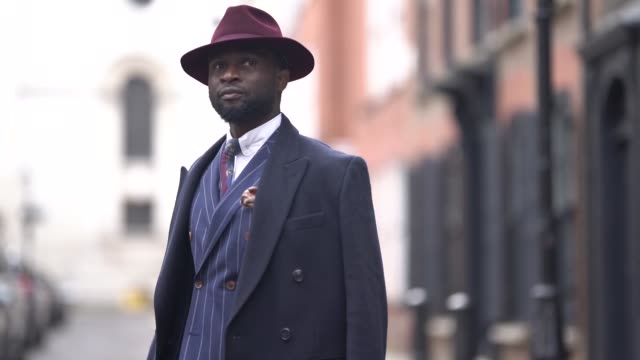 GBR: London Fashion Week Menswear A/W 2019 - street style