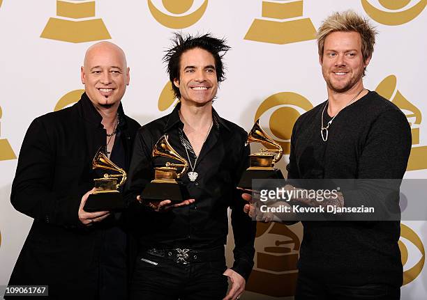 Jimmy Stafford, Pat Monahan, and Scott Underwood of the band Train, winners of the Best Pop Performance By A Duo Or Group With Vocals award for...