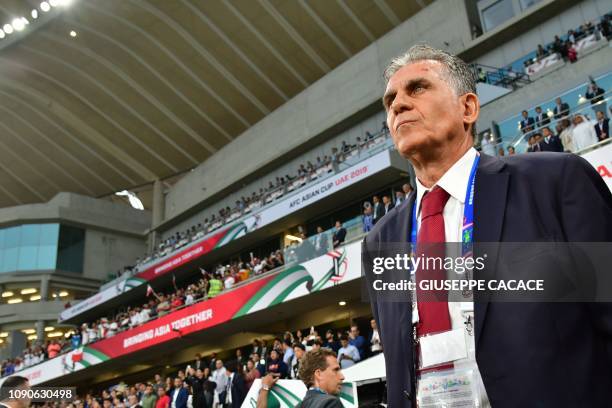Iran's coach Carlos Queiroz looks on during the 2019 AFC Asian Cup semi-final football match between Iran and Japan at the Hazza Bin Zayed Stadium in...