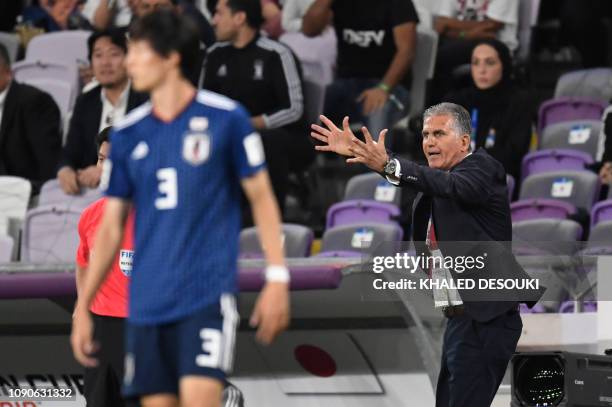 Iran's coach Carlos Queiroz reacts during the 2019 AFC Asian Cup semi-final football match between Iran and Japan at the Hazza Bin Zayed Stadium in...