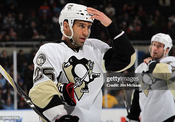 Maxime Talbot of the Pittsburgh Penguins skates against the New York Islanders on February 11, 2011 at Nassau Coliseum in Uniondale, New York. The...