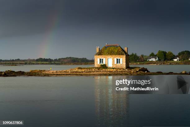 saint-cado, arc en ciel  dans la ria d'etel - house remote location stock pictures, royalty-free photos & images