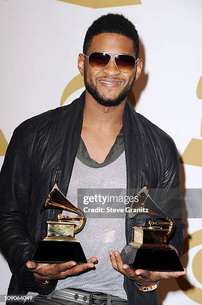 Singer Usher poses in the press room at The 53rd Annual GRAMMY Awards held at Staples Center on February 13, 2011 in Los Angeles, California.