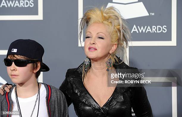 Singer Cyndi Lauper arrives with her son for the 53rd annual Grammy Awards at the Staples Center in Los Angeles on February 13, 2011. AFP PHOTO /...