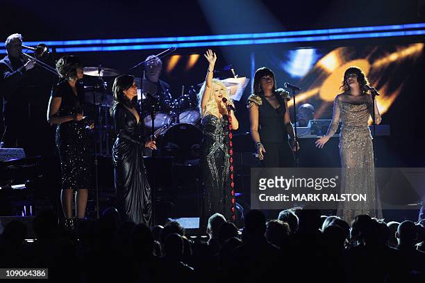 From left, Yolanda Adams, Martina McBride, Christina Aguilera, Jennifer Hudson and Florence Welch perform a tribute to Aretha Franklin at the 53rd...