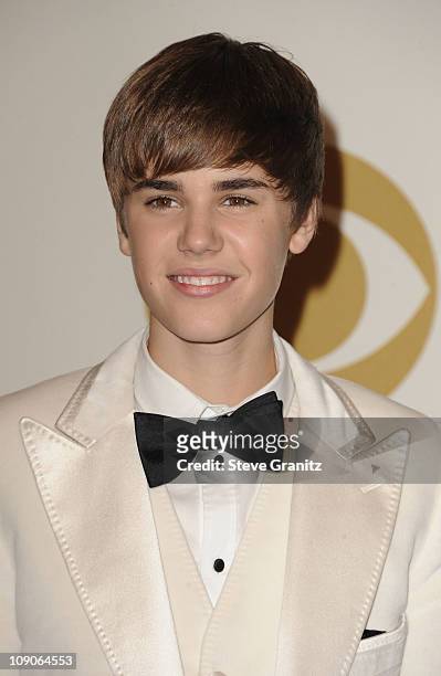 Singer Justin Bieber poses in the press room at The 53rd Annual GRAMMY Awards held at Staples Center on February 13, 2011 in Los Angeles, California.