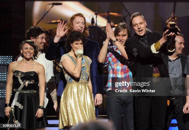 Musician Win Butler , Regine Chassagne and the band Arcade Fire accept Album of the Year award for "The Suburbs " onstage during The 53rd Annual...
