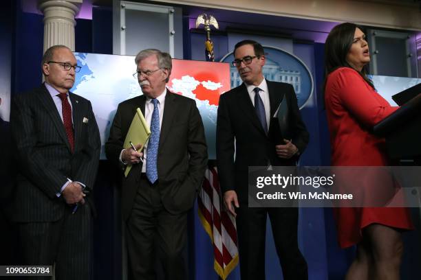 White House Press Secretary Sarah Sanders speaks during a press briefing along with Director of the U.S. National Economic Council Larry Kudlow, U.S....