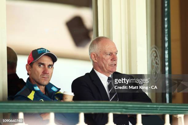 Australian coach Justin Langer talks to Australian Selector Greg Chappell during day five of the Fourth Test match in the series between Australia...