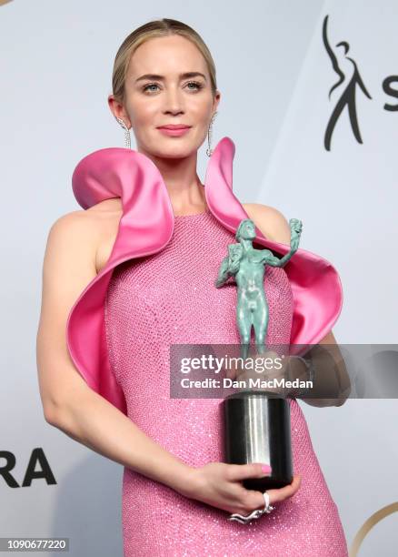 Emily Blunt poses in the press room with the award for Outstanding Performance by a Female Actor in a Supporting Role in 'A Quiet Place,' during the...