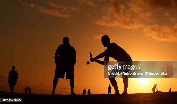 Jason McDermid from England prepares to hit the ball during a game of beach cricket at Maxwell beach on January 28, 2019 near Bridgetown, Barbados.