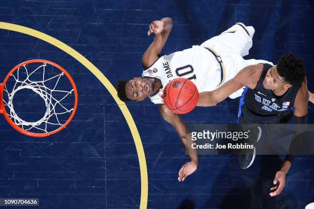 Cam Reddish of the Duke Blue Devils goes to the basket against TJ Gibbs of the Notre Dame Fighting Irish in the first half of the game at Purcell...