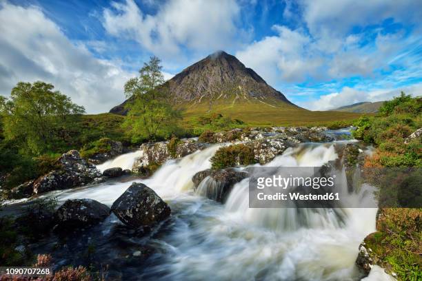 united kingdom, scotland, glencoe, highlands, glen coe, coupall falls of river coupall with mountain buachaille etive mor in background - glen etive mor stock pictures, royalty-free photos & images