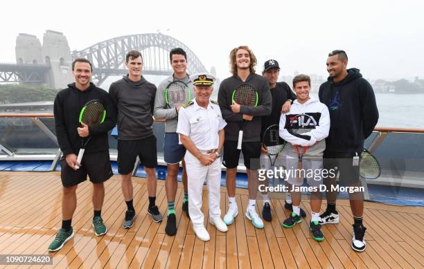 Captain Adriano Binacchi of cruise ship Carnival Spirit shares some fun with tennis players Bruno Soares, Jamie Murray, Milos Raonic, Stefanos...