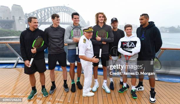 Captain Adriano Binacchi of cruise ship Carnival Spirit shares some fun with tennis players Bruno Soares, Jamie Murray, Milos Raonic, Stefanos...