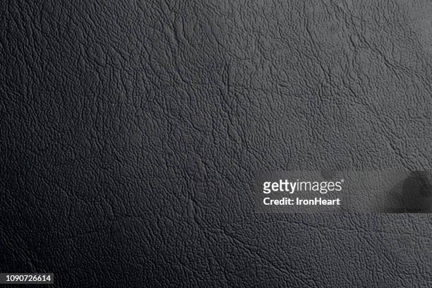 genuine leather texture - black leather stock-fotos und bilder