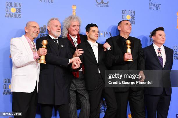 Jim Beach, Roger Taylor and Brian May of Queen, Rami Malek, Graham King, and Mike Myers pose in the press room during the 75th Annual Golden Globe...