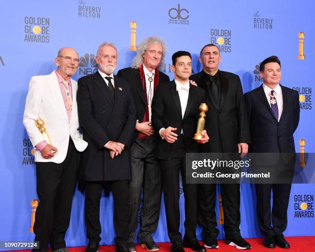 Jim Beach, Roger Taylor and Brian May of Queen, Rami Malek, Graham King, and Mike Myers pose in the press room during the 75th Annual Golden Globe...