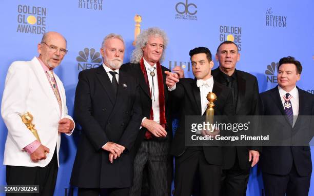 Jim Beach, Roger Taylor and Brian May of Queen, Rami Malek, Graham King, and Mike Myers pose in the press room during the 75th Annual Golden Globe...