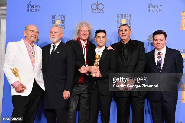 Jim Beach, Roger Taylor and Brian May of Queen, Rami Malek, Graham King, and Mike Myers pose in the press room during the 75th Annual Golden Globe...