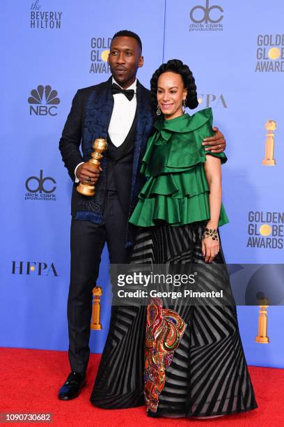 Best Motion Picture, Musical or Comedy, award for 'Green Book' winner Mahershala Ali and Amatus Sami-Karim pose in the press room during the 75th...