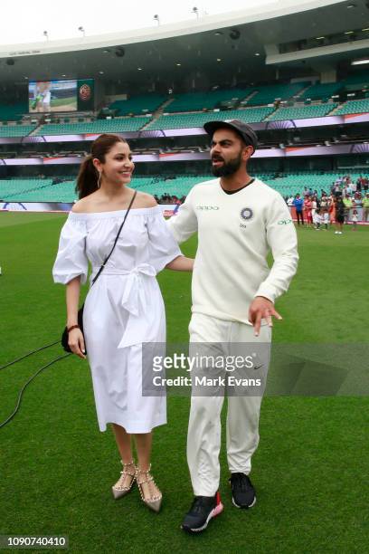 Indian Cricket Captain Virat Kohli and his wife Anushka Sharma after winning the series and the Border–Gavaskar Trophy during day five of the Fourth...