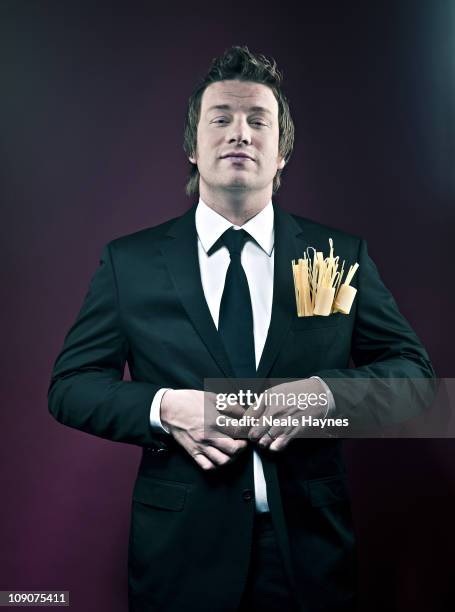 Chef Jamie Oliver poses for a portrait shoot in London, December 4, 2010.