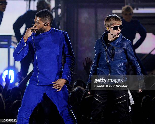 Singers Usher and Justin Bieber perform onstage during the 53rd Annual GRAMMY Awards held at Staples Center on February 13, 2011 in Los Angeles,...