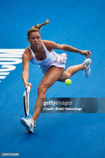 Camila Giorgi of Italy plays a forehand shot against Ajla Tomljanovic of Australia during day two of the 2019 Sydney International at Sydney Olympic...