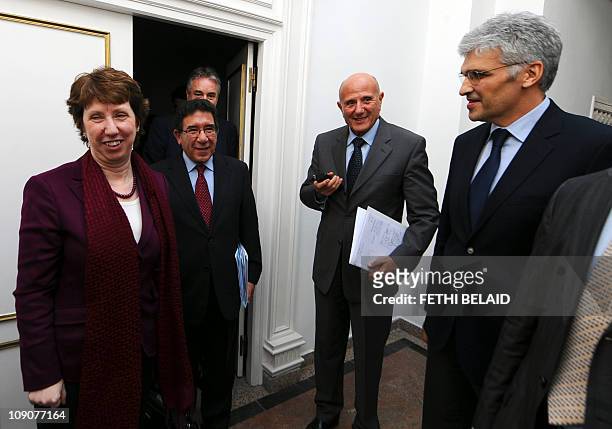 Europeean Union Foreign Affairs Chief Catherine Ashton is greeted by with Tunisian Secretary of States for Foreign Affairs Radhouane Rouissi ,...