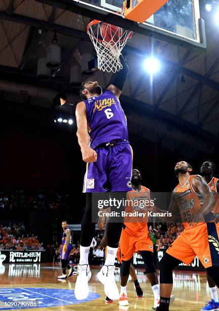 Andrew Bogut of the Kings slam dunks during the round 12 NBL match between the Cairns Taipans and the Sydney Kings at Cairns Convention Centre on...